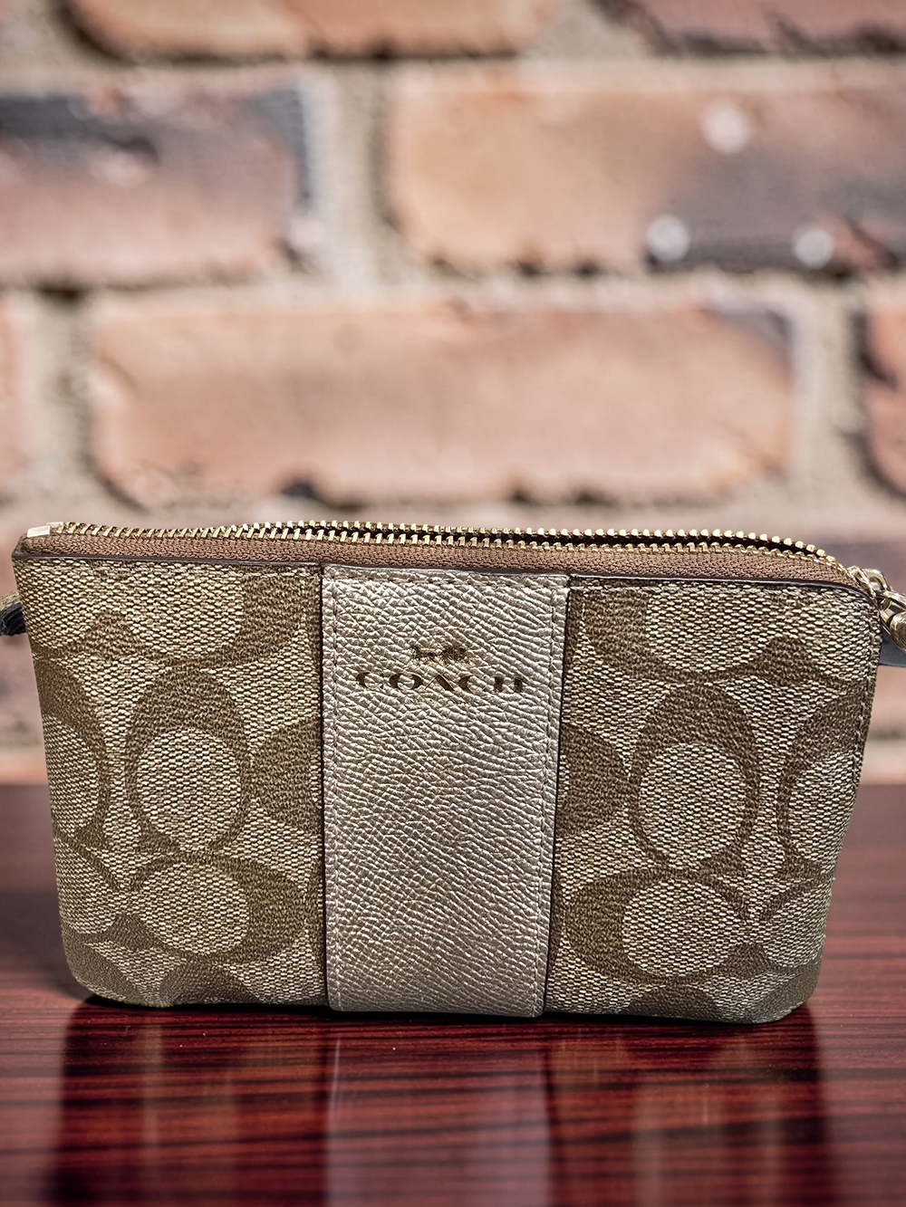 COACH Corner Zip Wristlet in Signature Canvas with Metallic Stripe